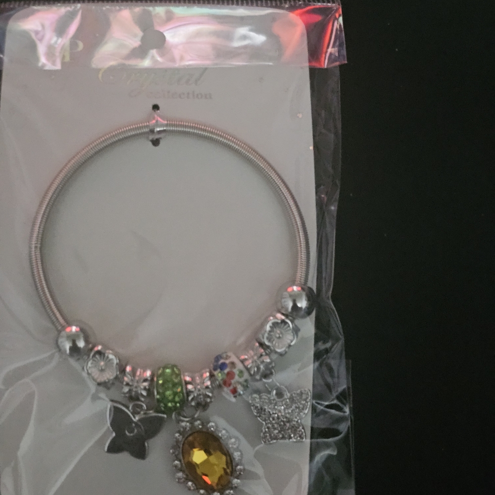 Elegant Silver Bracelet with Green and Yellow Accents